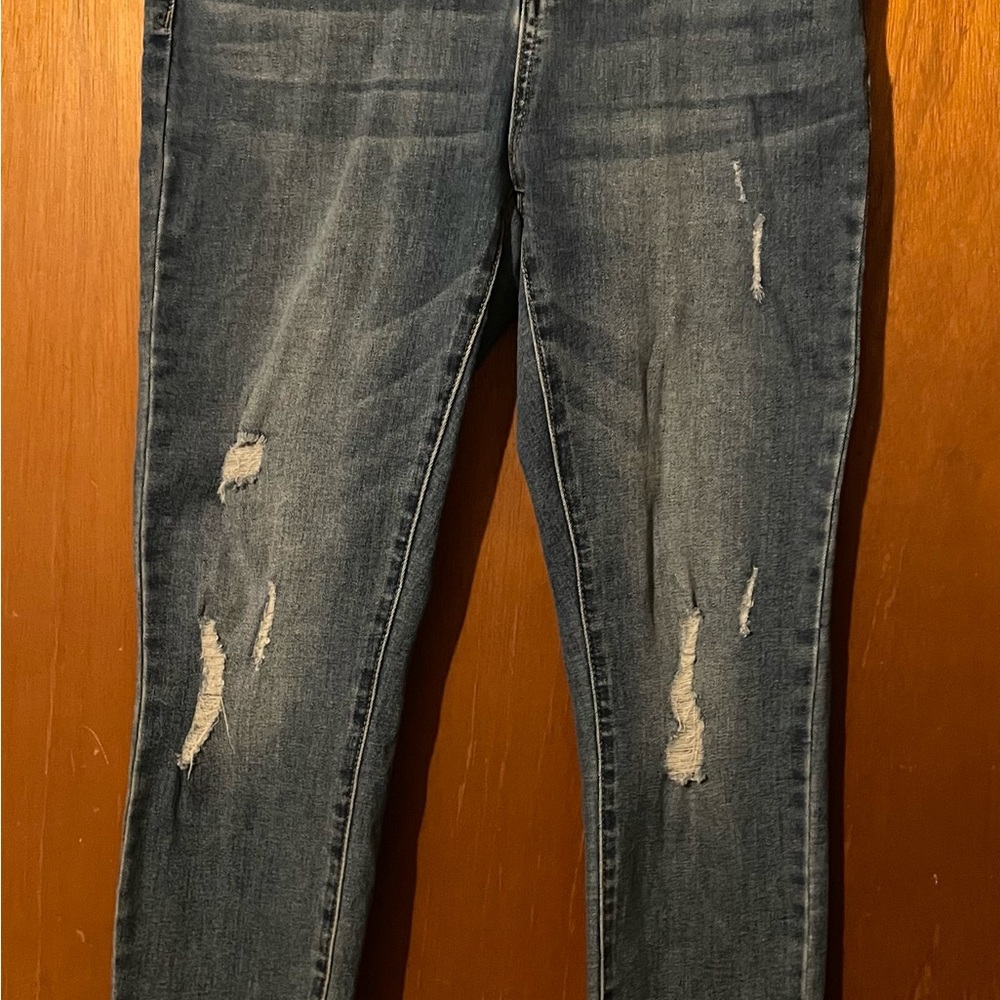 Blue Skinny Jeans with Distressed Details